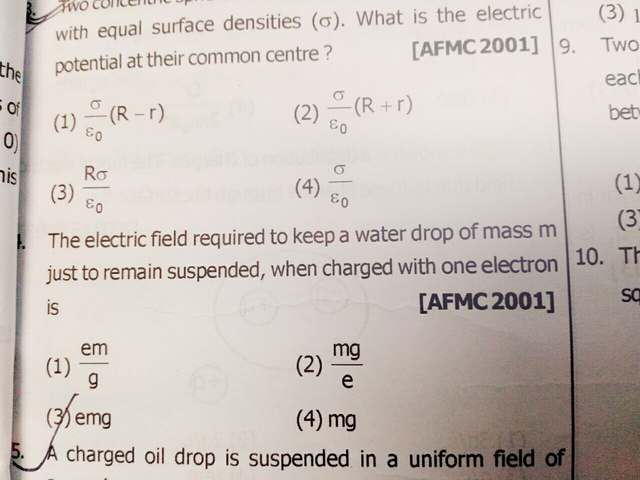 The electric field required to keep a water drop of mass m just to re