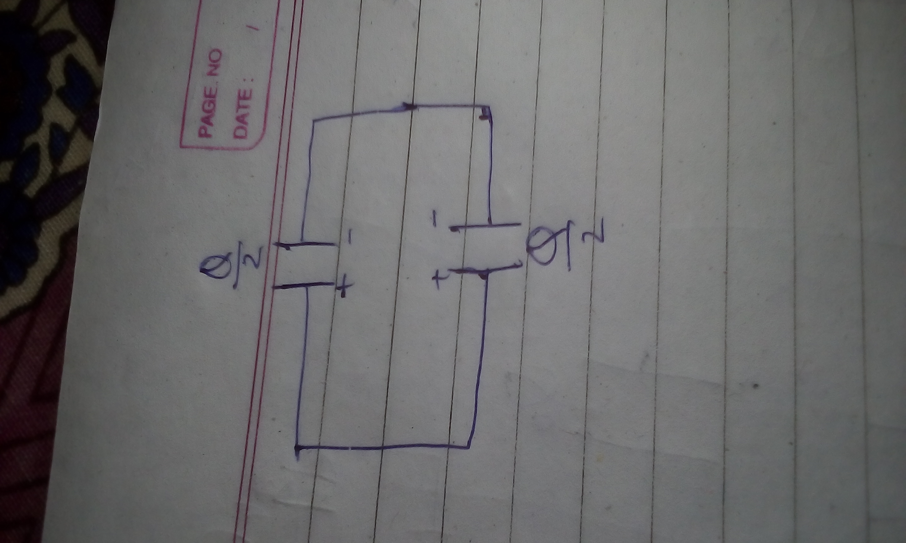 Two capacitors each having area a and plate separation d are connecte